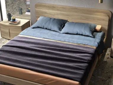 Letto in essenza legno con testiera Glow di Mab