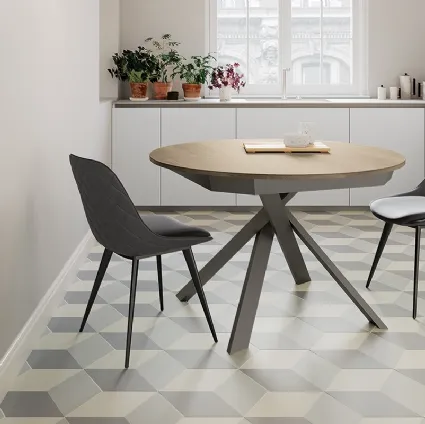 Tavolo rotondo allungabile Twist con top in laminato e gambe in metallo verniciato di Arredo3