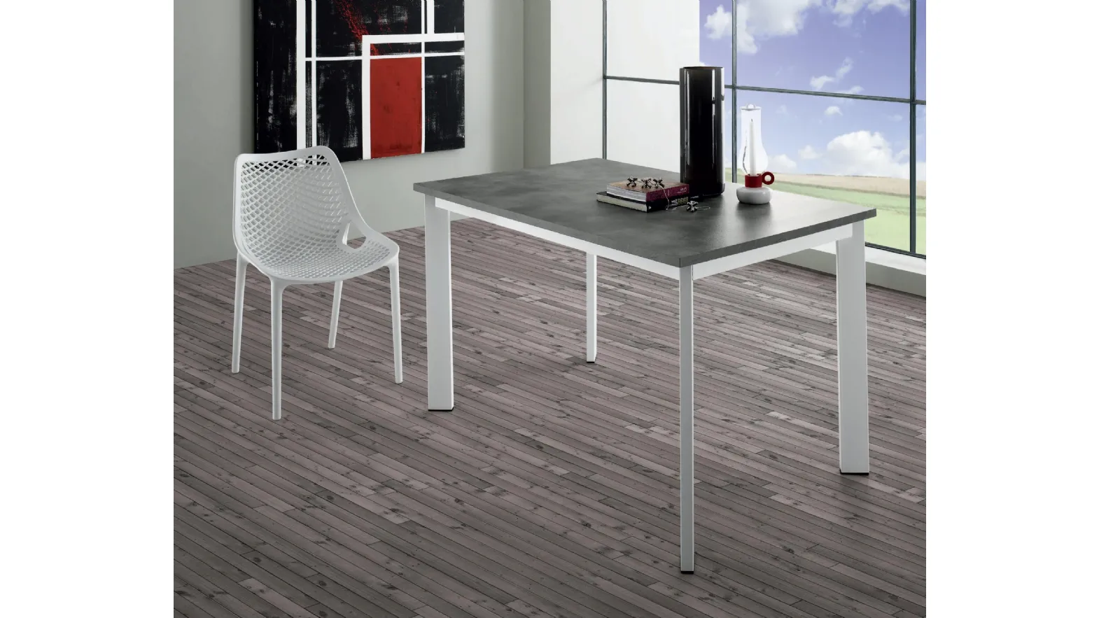 Tavolo Evo con top in laminato cemento e base in metallo di Eurosedia